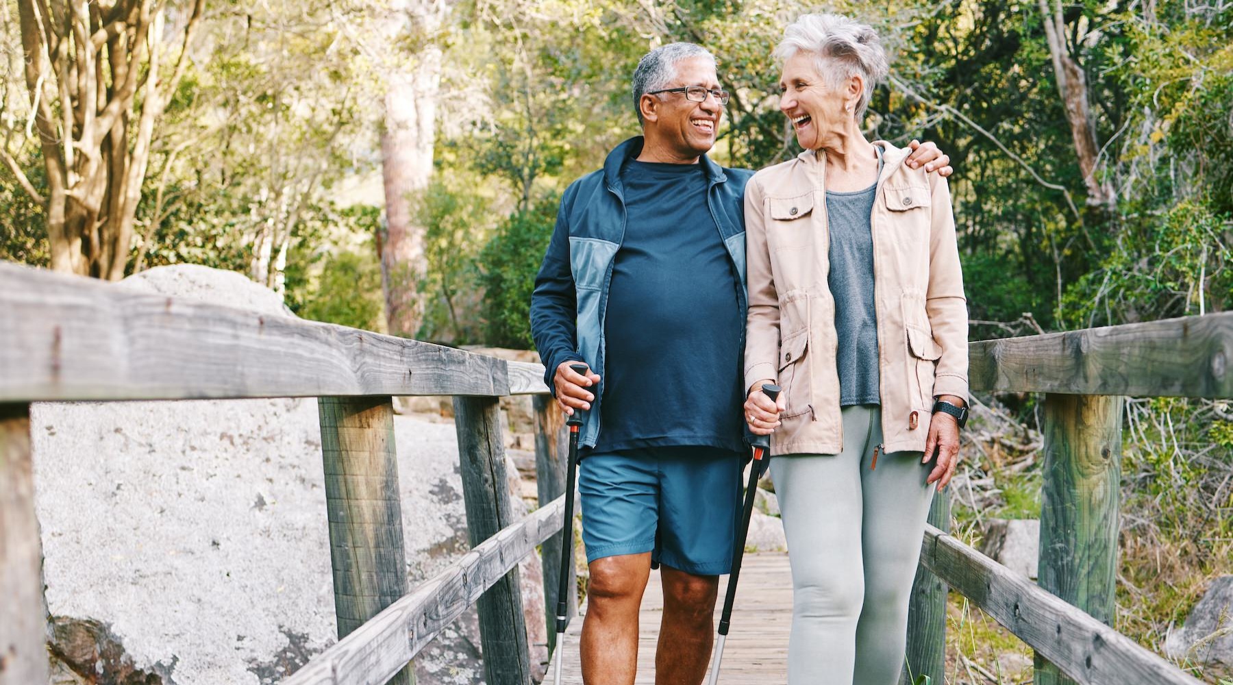 A beautiful community at the heart of all your passions a couple walking together on a bridge